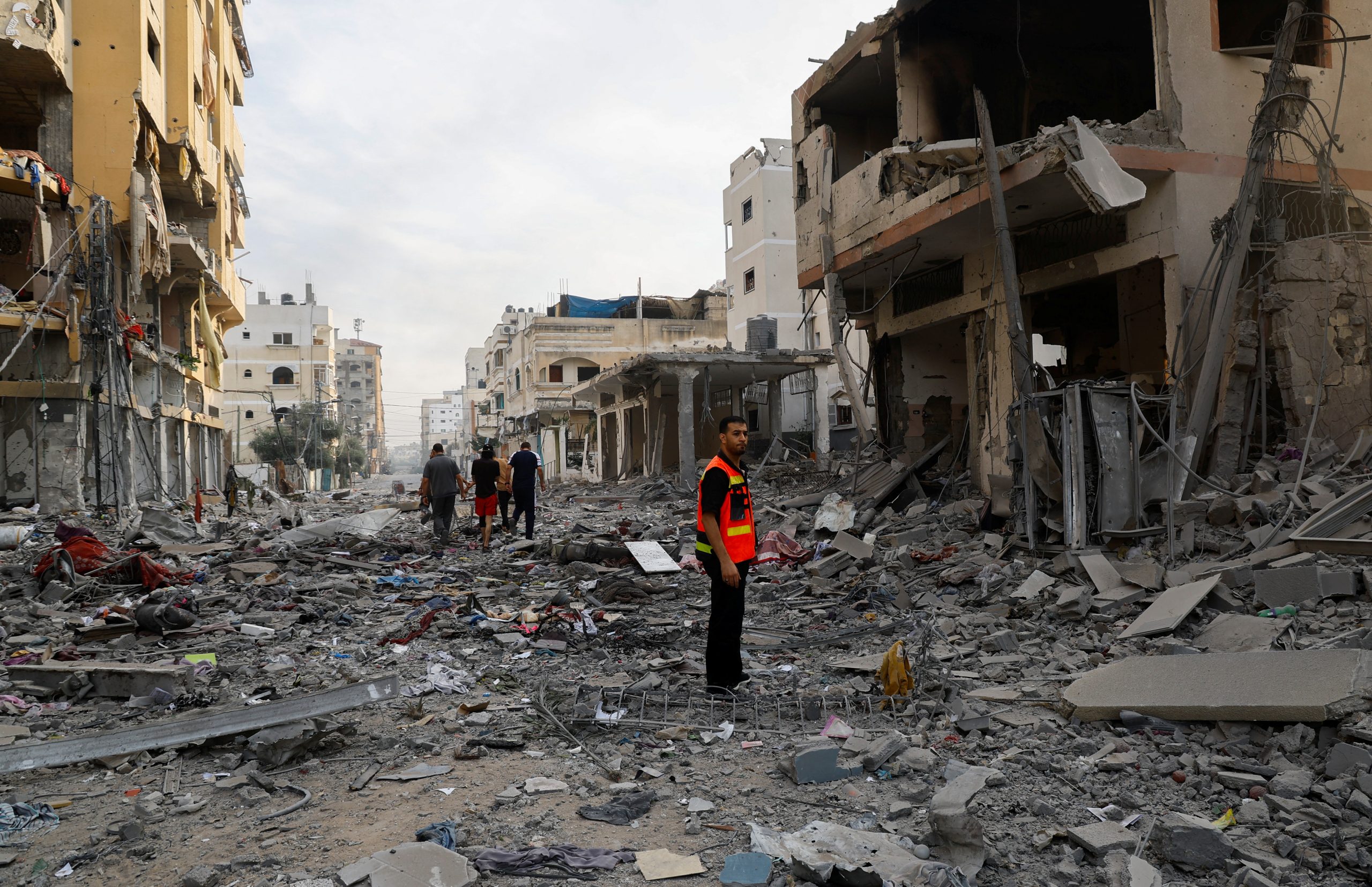 A rescuer looks on amid debris in the aftermath of Israeli strikes, in Gaza City, October 11, 2023. REUTERS/Mohammed Salem