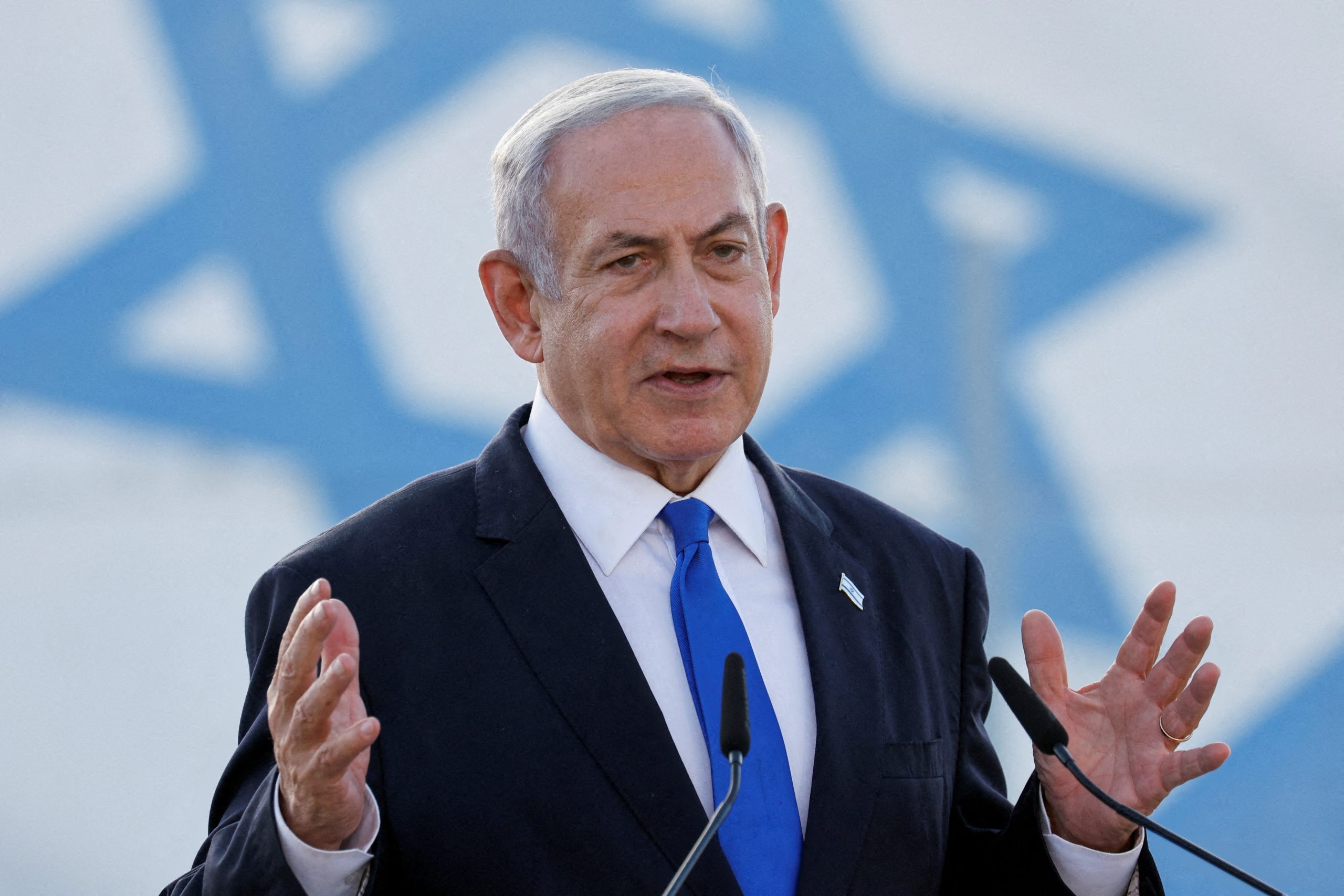 FILE PHOTO: Israeli Prime Minister Benjamin Netanyahu delivers a statement at the Palmachim Air Force Base near the city of Rishon Lezion, Israel July 5, 2023. REUTERS/Amir Cohen/File Photo