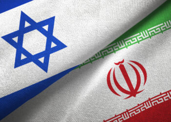 Israel and Iran flags together textile cloth, fabric texture