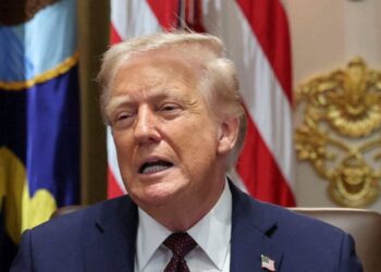 U.S. President Donald Trump reacts during a cabinet meeting at the White House in Washington, D.C., U.S., August 26, 2025. REUTERS/Jonathan Ernst
