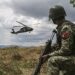 A Turkish soldier, with Multinational Battle Group-East, watches as a UH-60 Black Hawk gets ready to land after receiving a 9-line call for a simulated casualty. U.S. and NATO forces have contributed to the United Nations-mandated peacekeeping mission in Kosovo since June 1999. (Photo by Staff Sgt. Donna Davis, Multinational Battle Group-East public affairs)