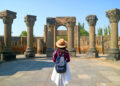 Female Traveler Visiting the Zvartnots Cathedral, UNESCO World Heritage Site in Armavir Province of Armenia