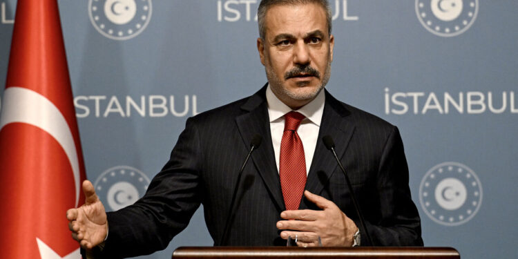 Turkish Foreign Minister Hakan Fidan gestures as he speaks during a press conference after a meeting with his counterparts from Saudi Arabia, Qatar, the United Arab Emirates, Jordan, Pakistan and Indonesia in Istanbul on November 3, 2025. Turkey on November 3, 2025, hosts a string of top diplomats from the Islamic world to bring their influence to bear on the future of Gaza, as fears grow for the increasingly fragile truce. The October 10 ceasefire in the two-year-long Israel-Hamas war, brokered by US President Donald Trump, has been sorely tested by continued Israeli strikes and claims of Palestinian attacks on Israeli soldiers. (Photo by Ozan KOSE / AFP) (Photo by OZAN KOSE/AFP via Getty Images)