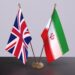 Iran and UK flag. Politics concept, partner deal beetween countries. Partnership agreement of governments 3D illustration.