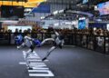 Humanoid robots by Unitree Robotics demonstrate kickboxing during the 2026 World Robot Conference, in Beijing, China, August 19, 2026. REUTERS/Tingshu Wang