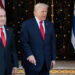 U.S. President Donald Trump speaks next to Israeli Prime Minister Benjamin Netanyahu upon arrival for meetings at Trump's Mar-a-Lago club in Palm Beach, Florida, U.S., December 29, 2025. REUTERS/Jonathan Ernst