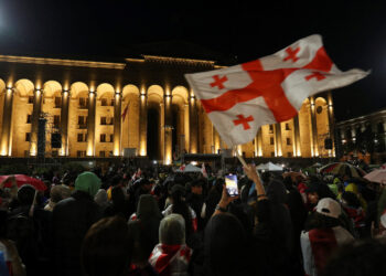 Demonstrators hold a rally to protest against a bill on "foreign agents", near Georgian Parliament building, in Tbilisi, Georgia, May 13, 2024. REUTERS/Irakli Gedenidze